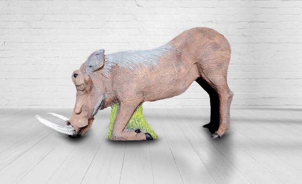 Warzenschwein äsend